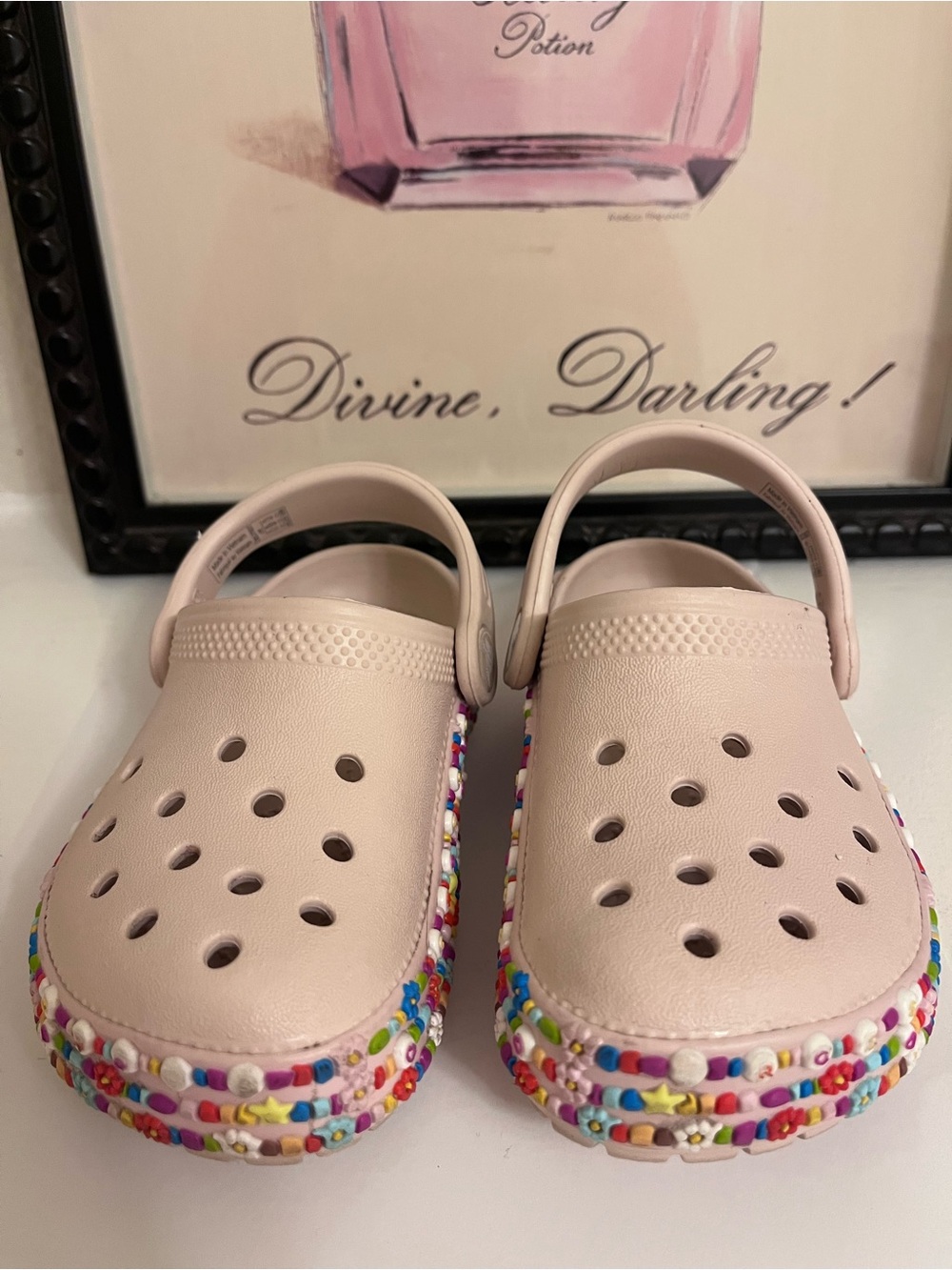 CROCS Kids Classic Clogs in Pink with Multicolor Friendship Bracelet Trim - C9